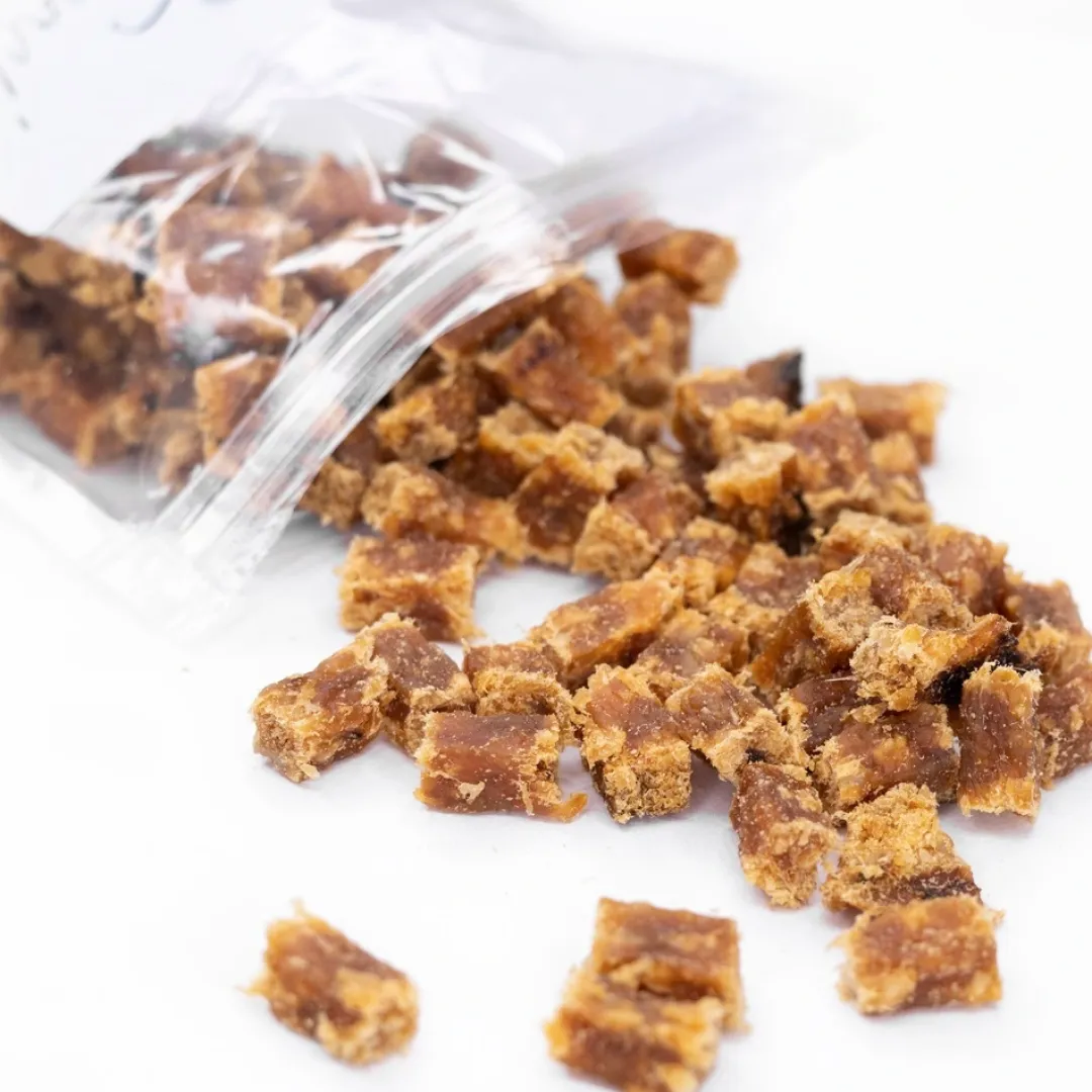 Snackit Kvalitetssnacks til hunde Snackit Bløde Perlehøne terninger 100 g - naturlige hundesnacks
